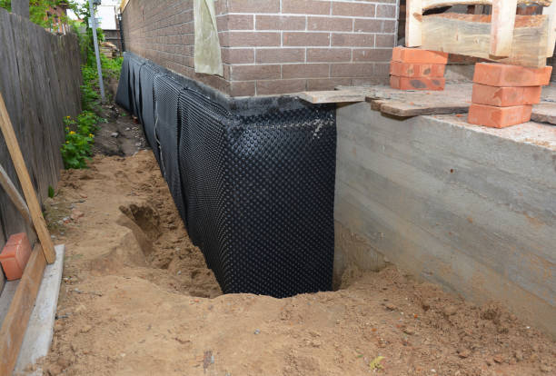 Happy homeowners after waterproofing job in Northbrook